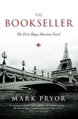 balck and white book cover with Paris elaborate bridge over the Seine in the foreground and Eifel Tower in the background