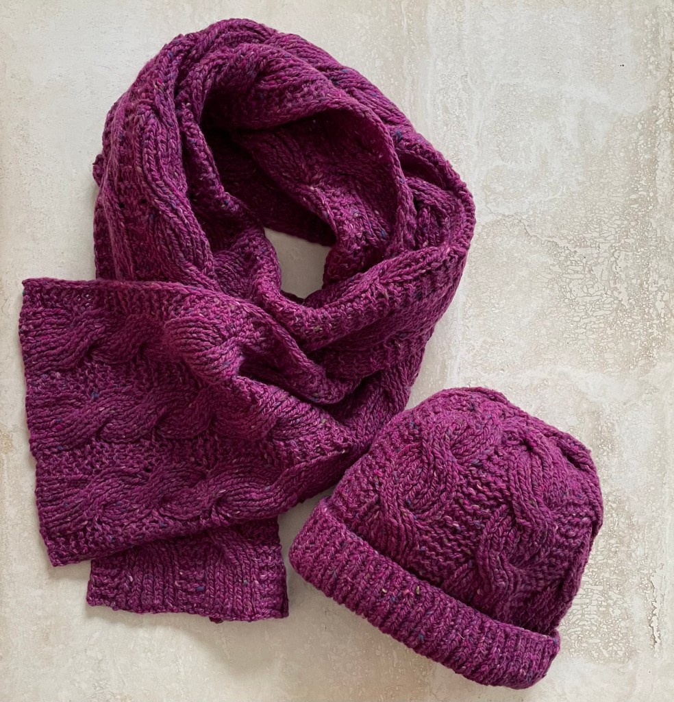 hand knit cable scarf and beanie in magenta tweed yarn