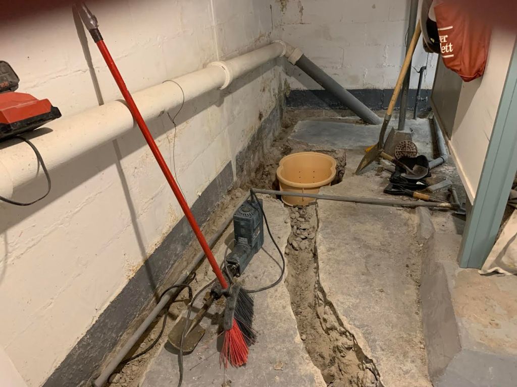 basement construction with new sump pump installed