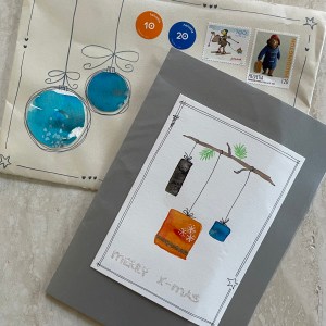 handpainted holiday images on card and envelope with Swiss postage stamps