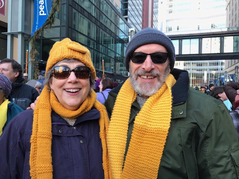 winter weather clothing with bright gold scarves