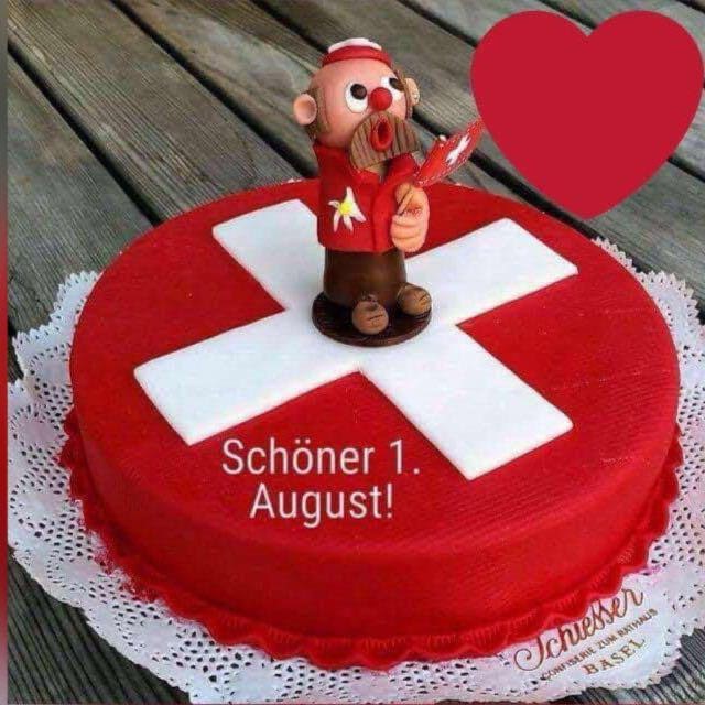 cake frosted like the Swiss flag with the German greeting beautiful 1 August