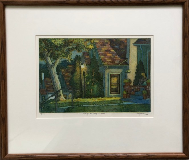 wood framed lithogrpah depicting a girl sitting on a front porch on a summer evening