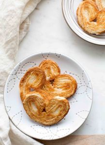 palmiers (cookies) on a white plate